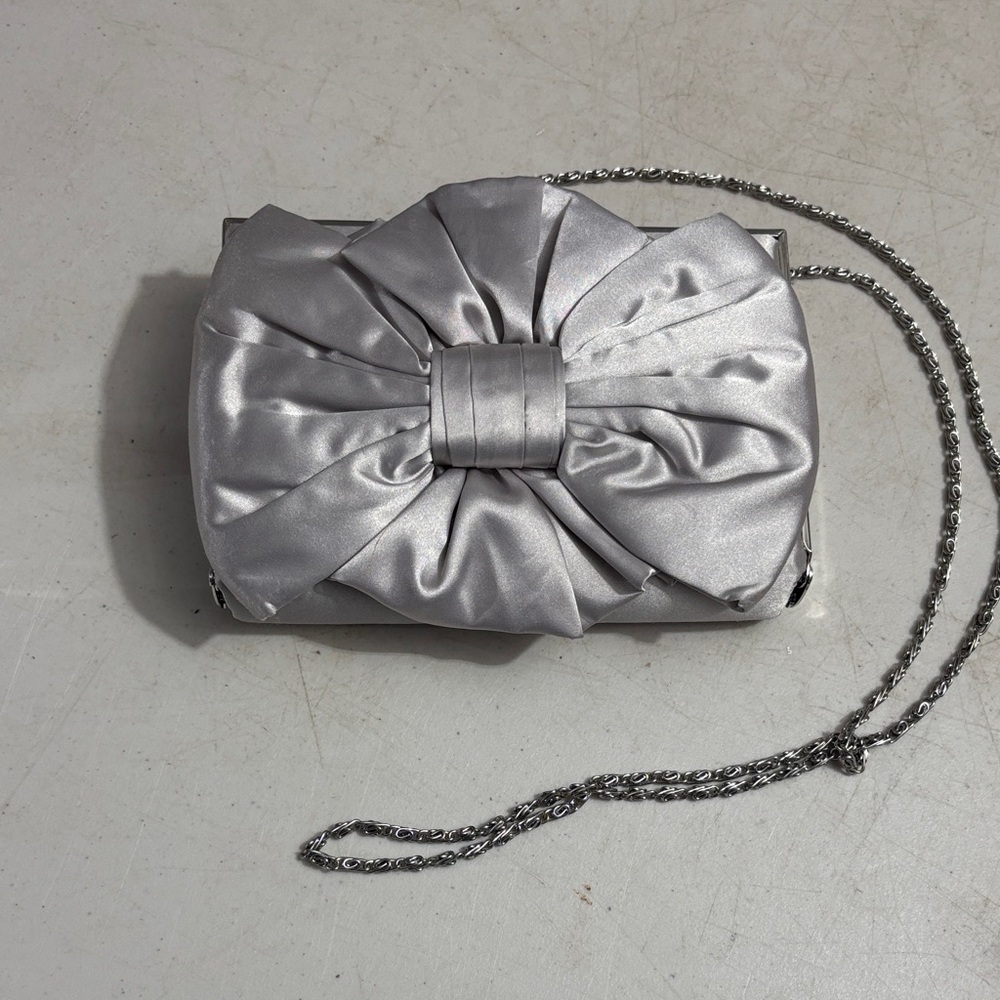 Jessica McClintock Silver Bow Clutch